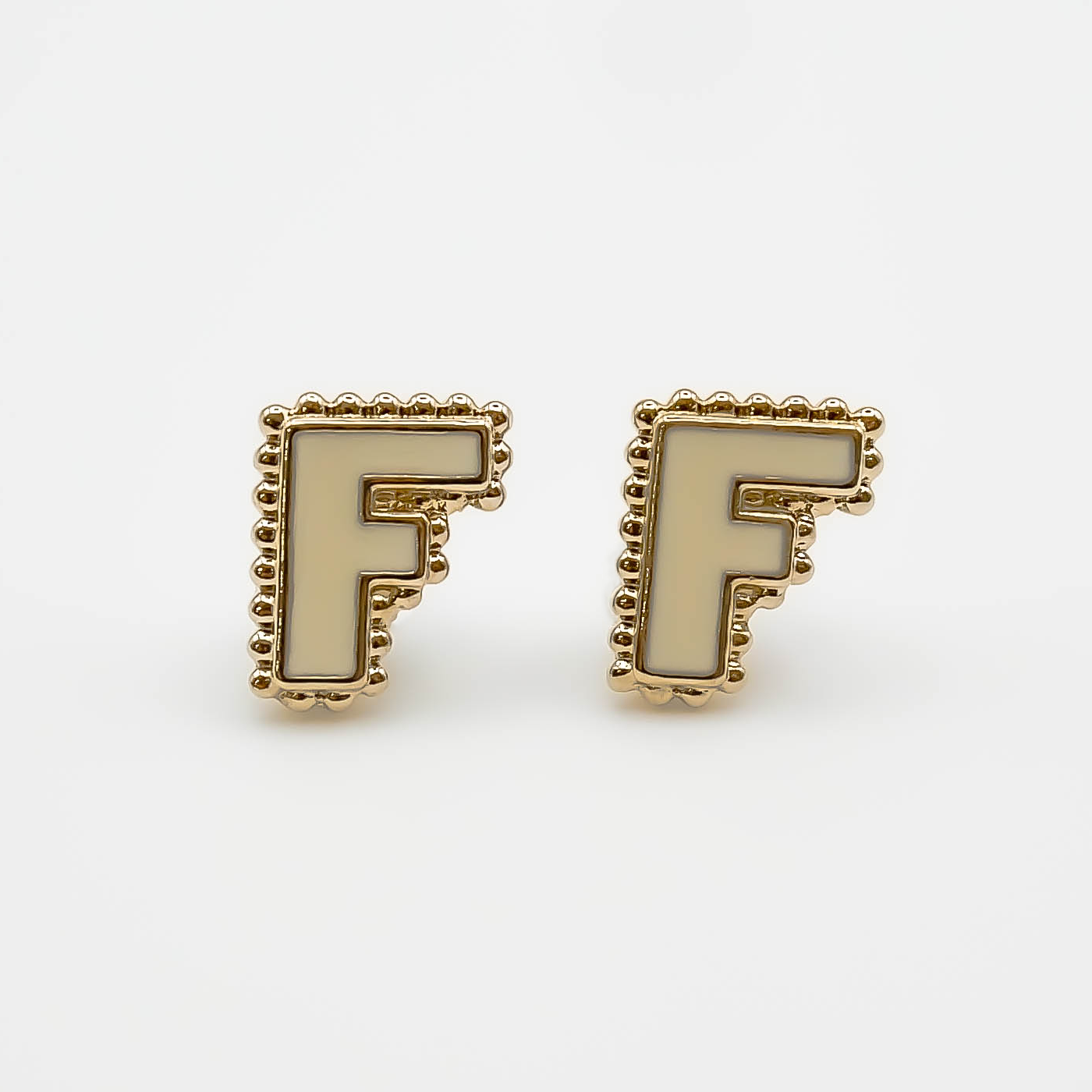 Boucles d'oreilles puce F