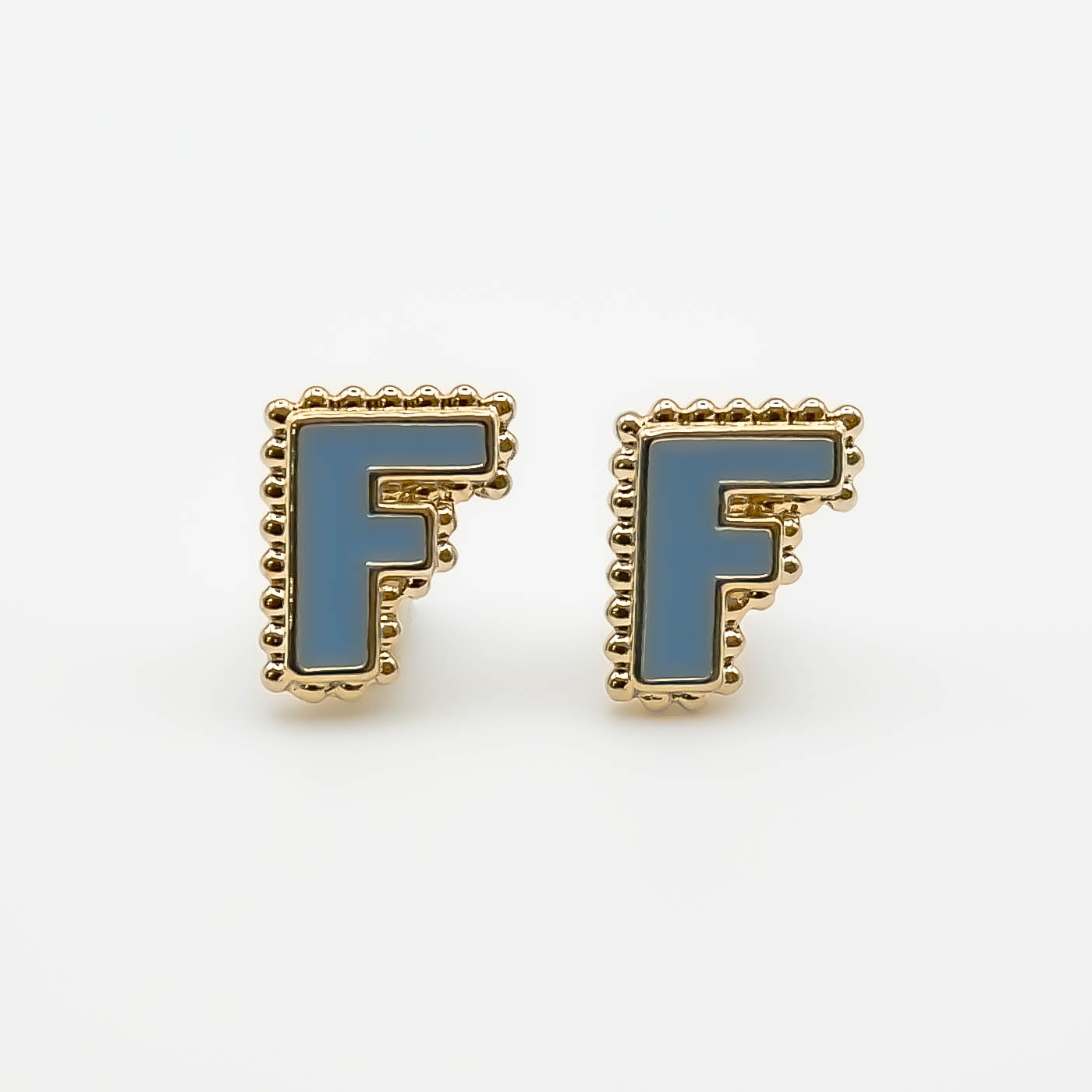 Boucles d'oreilles puce F