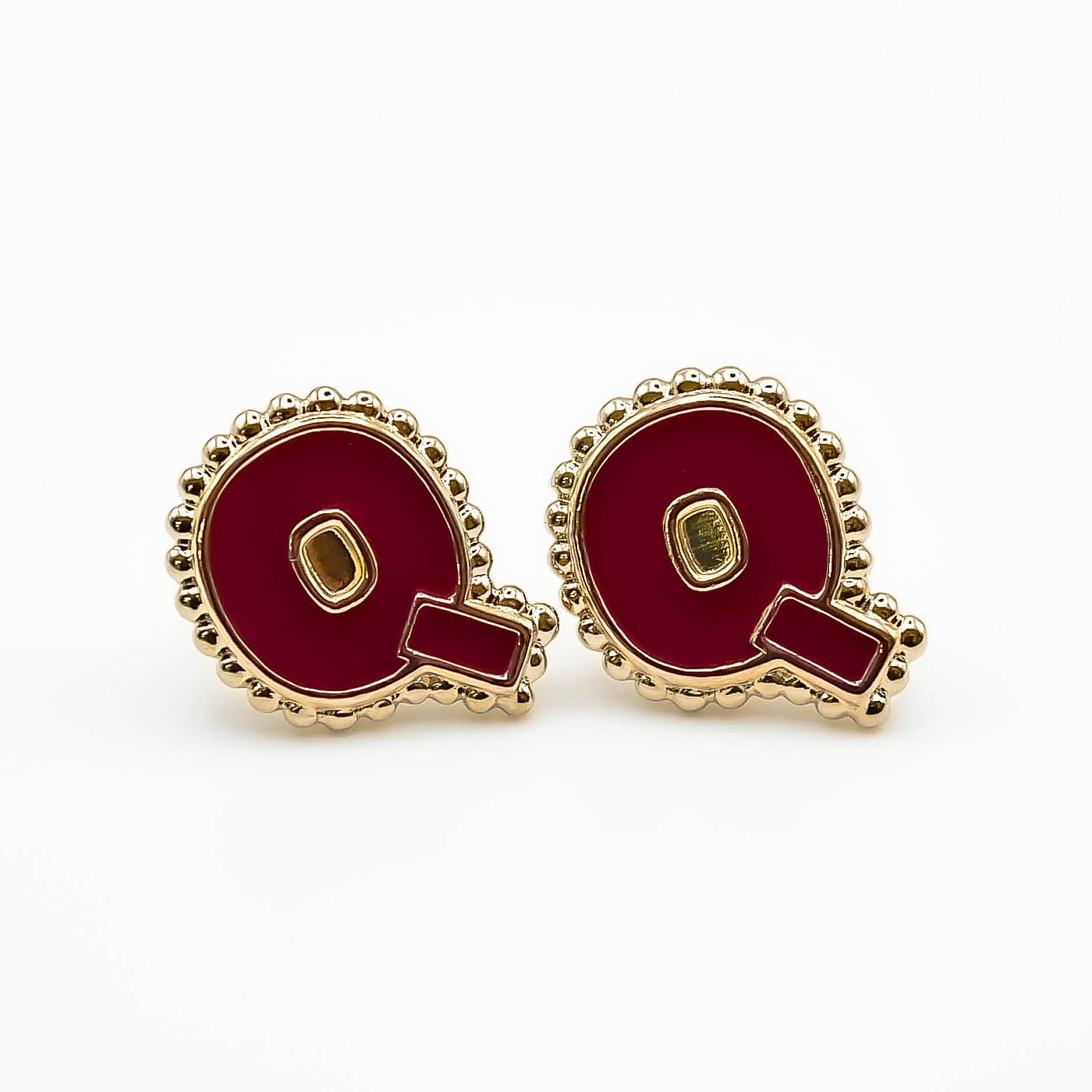 Boucles d'oreilles puce Q