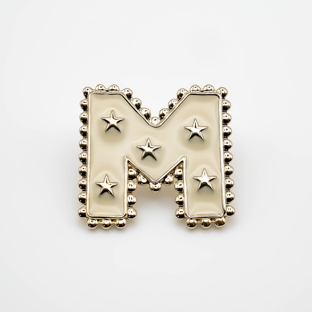 Pin's M