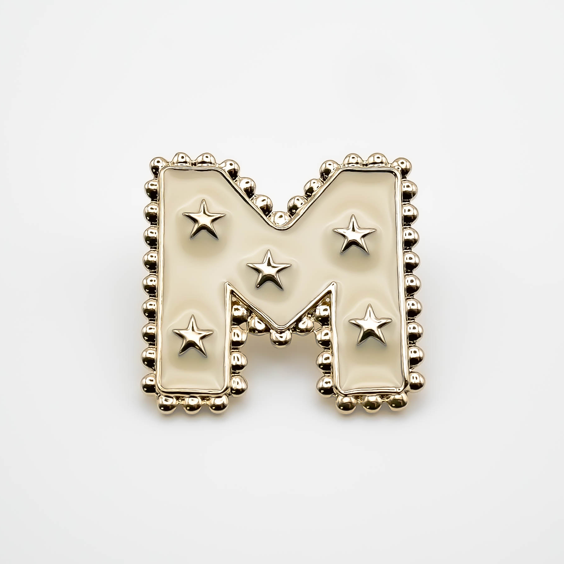 Pin's M