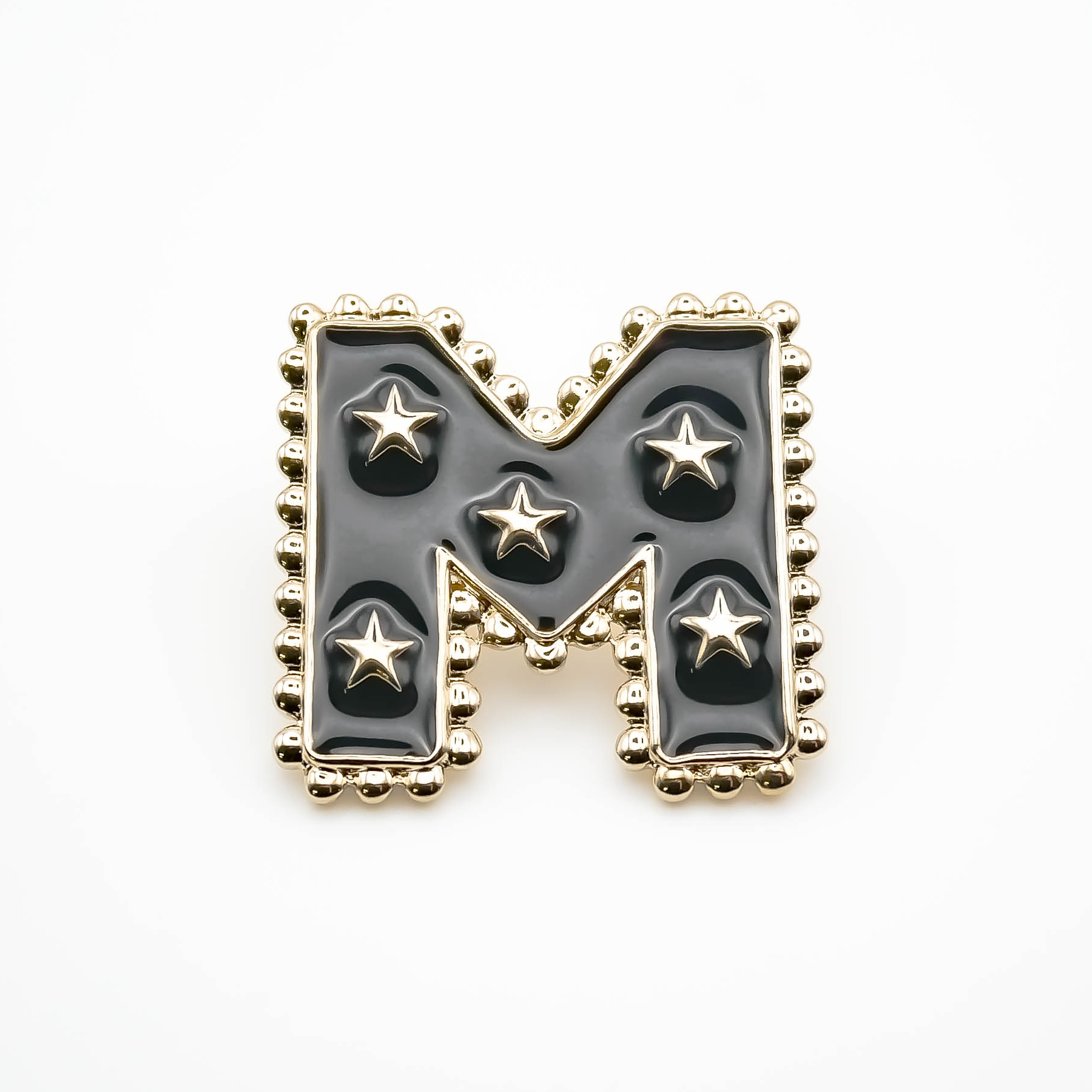 Pin's M