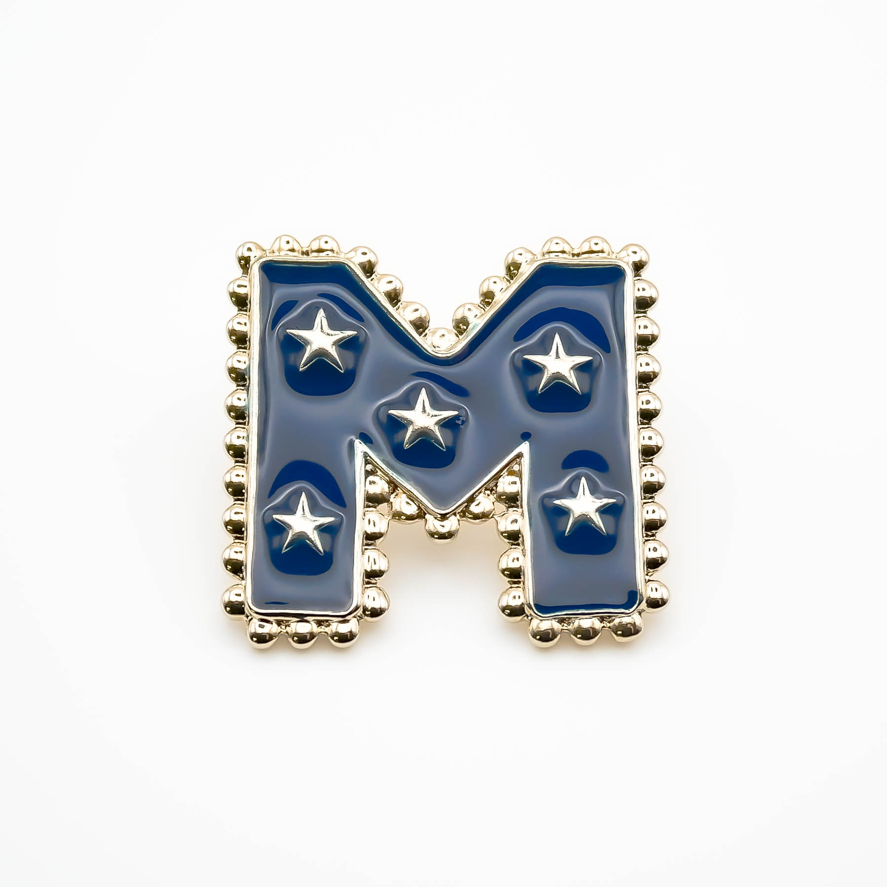 Pin's M