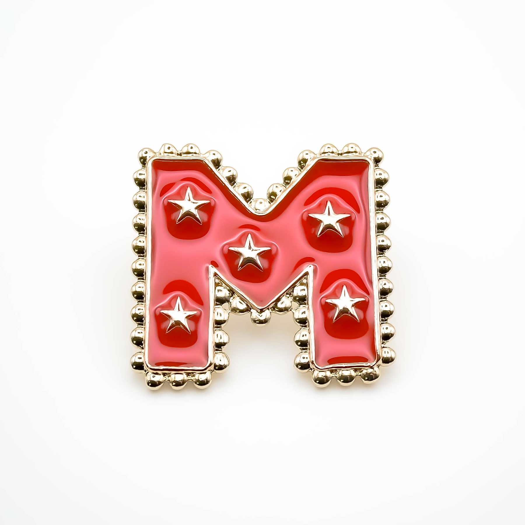 Pin's M