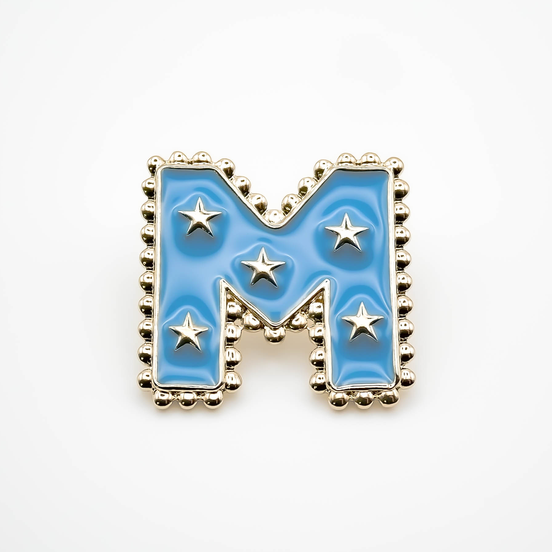 Pin's M