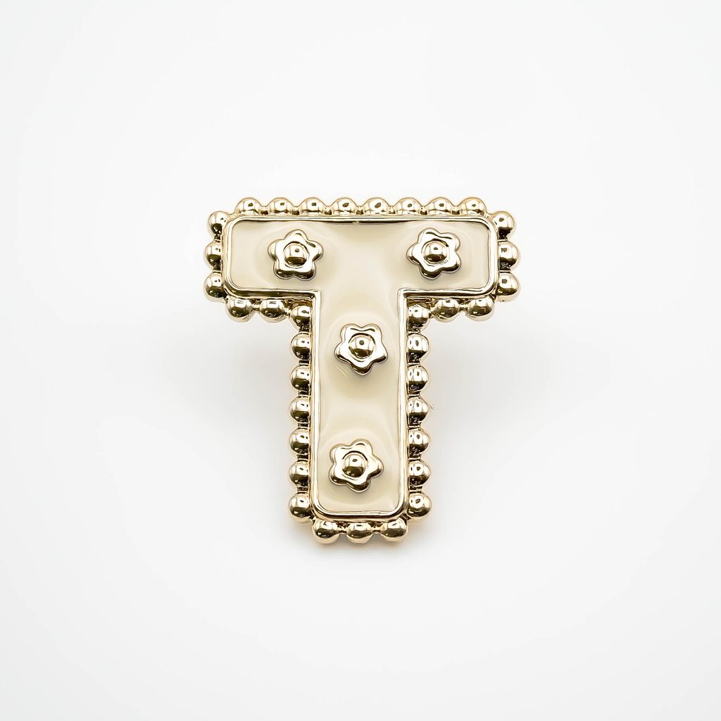 Pin's T