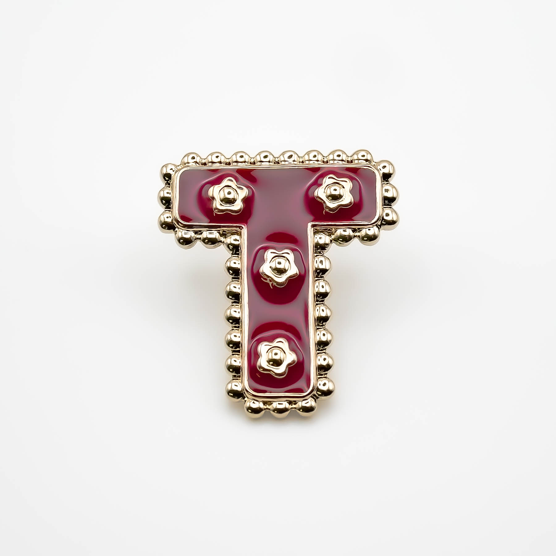 Pin's T