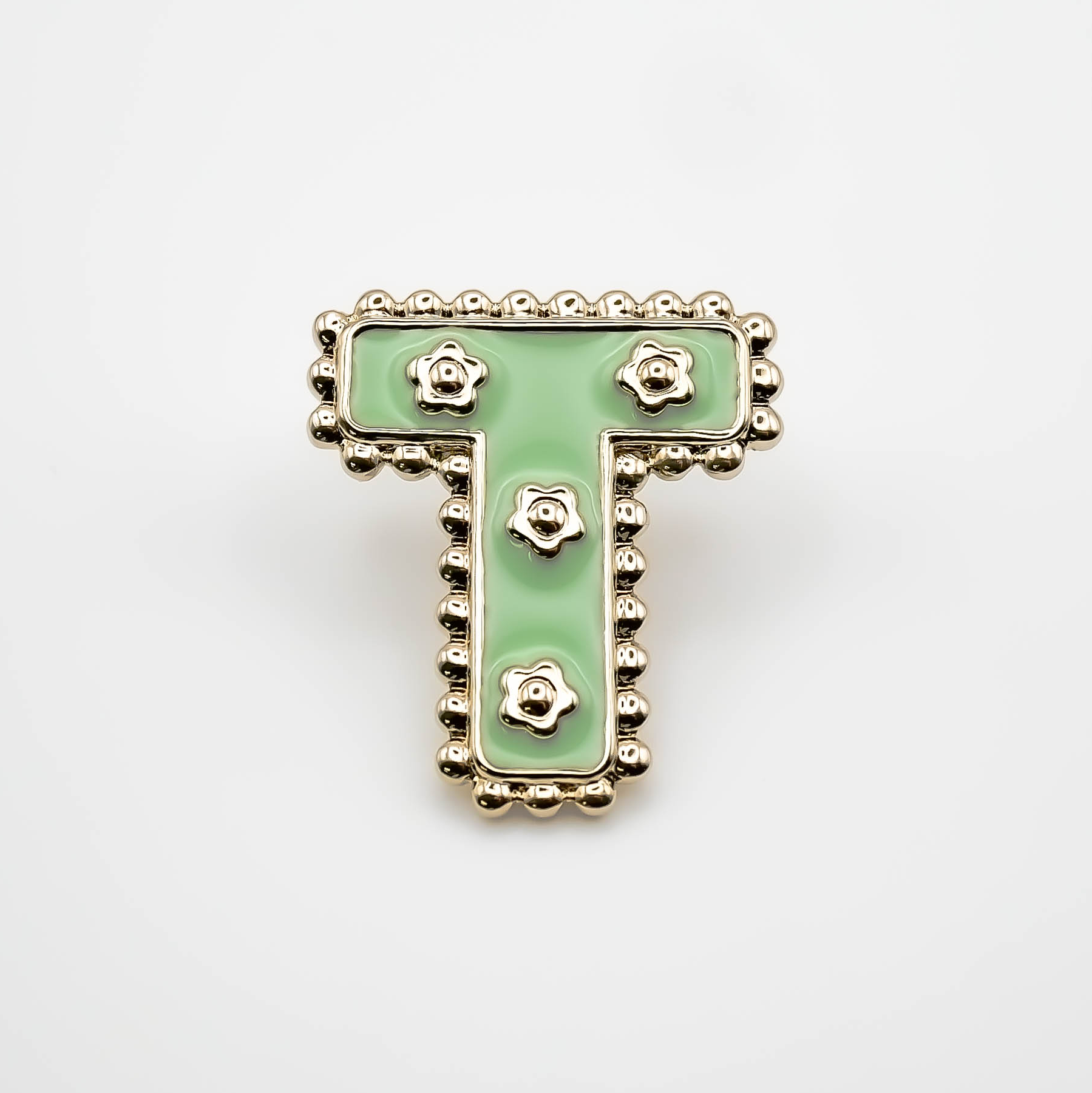 Pin's T